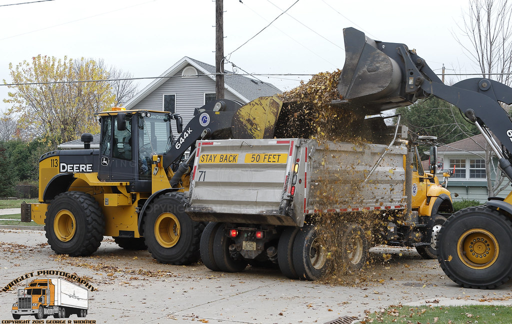 City of Oshkosh DPW Dump truck 71 gets doubleteamed by tw… Flickr