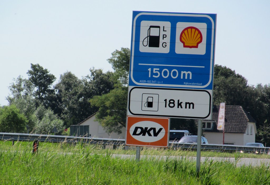 A28 Haerst2 Advance sign for a gas station, with the dist… Flickr