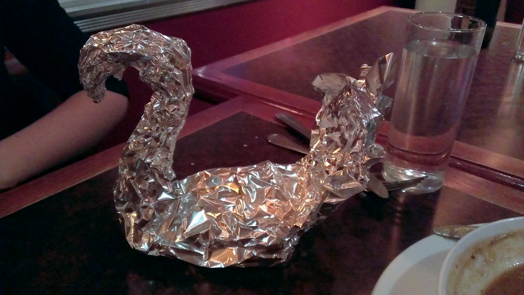 Day 188 "Swan" An aluminum foil swan holds our friend's l… Flickr