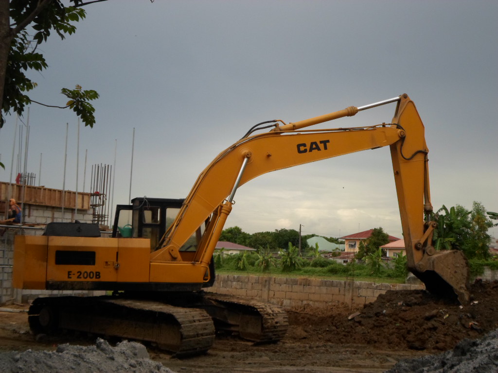 Caterpillar BackHoe at Work Caterpillar Back Hoe, please g… Flickr