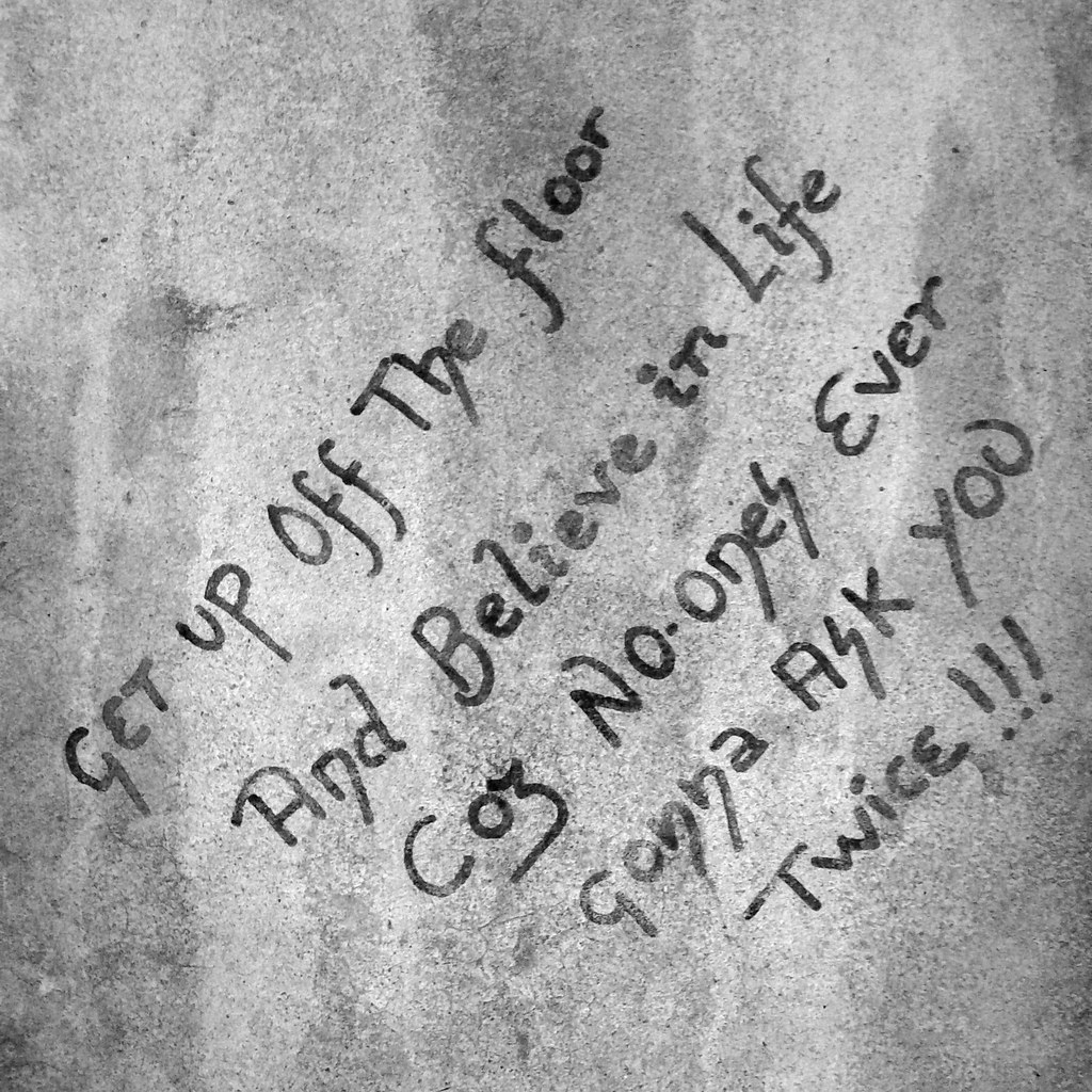 D'you know what I mean? Oasis lyric written on a car park … Flickr