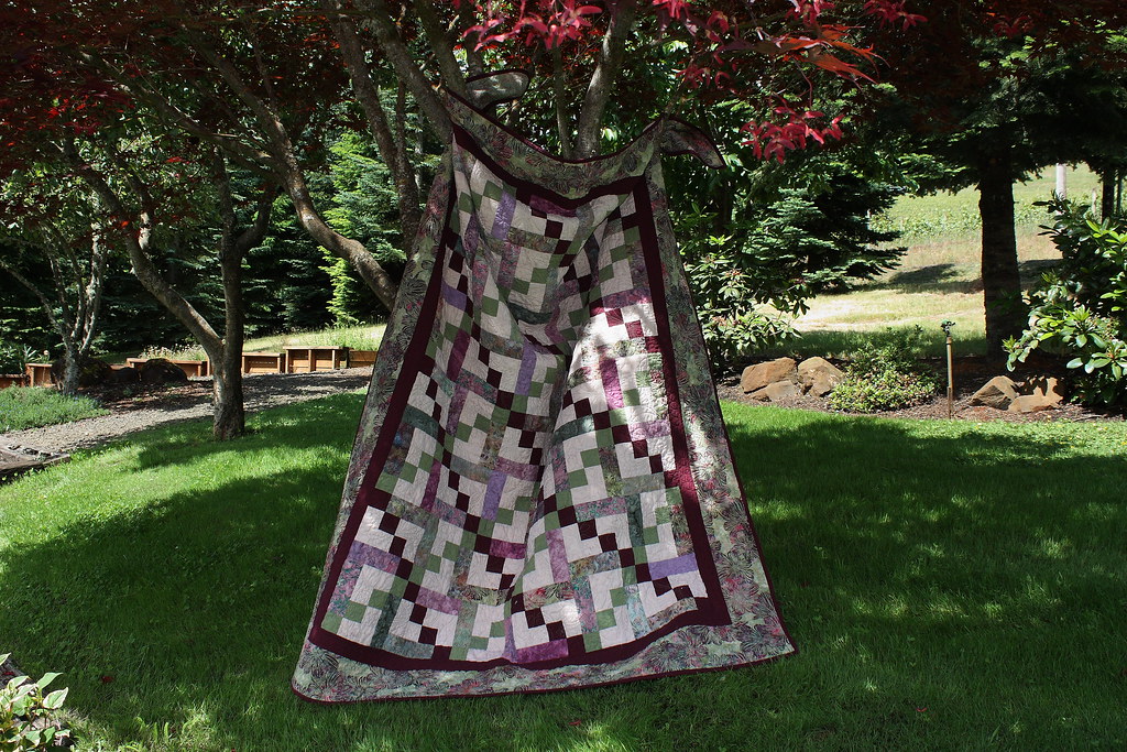 Under the flowering plum tree More shots of some new quilt… Flickr