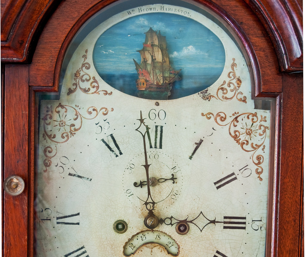 Grandfather clock detail Face detail from our family grand… Flickr