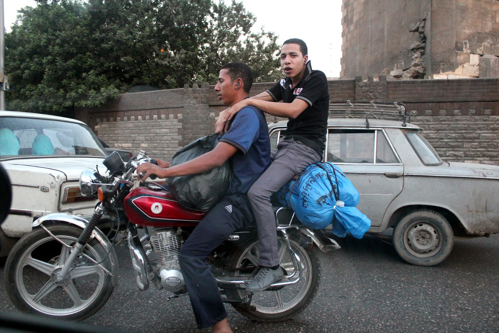 two guys on a motorcycleCairo Street W Flickr