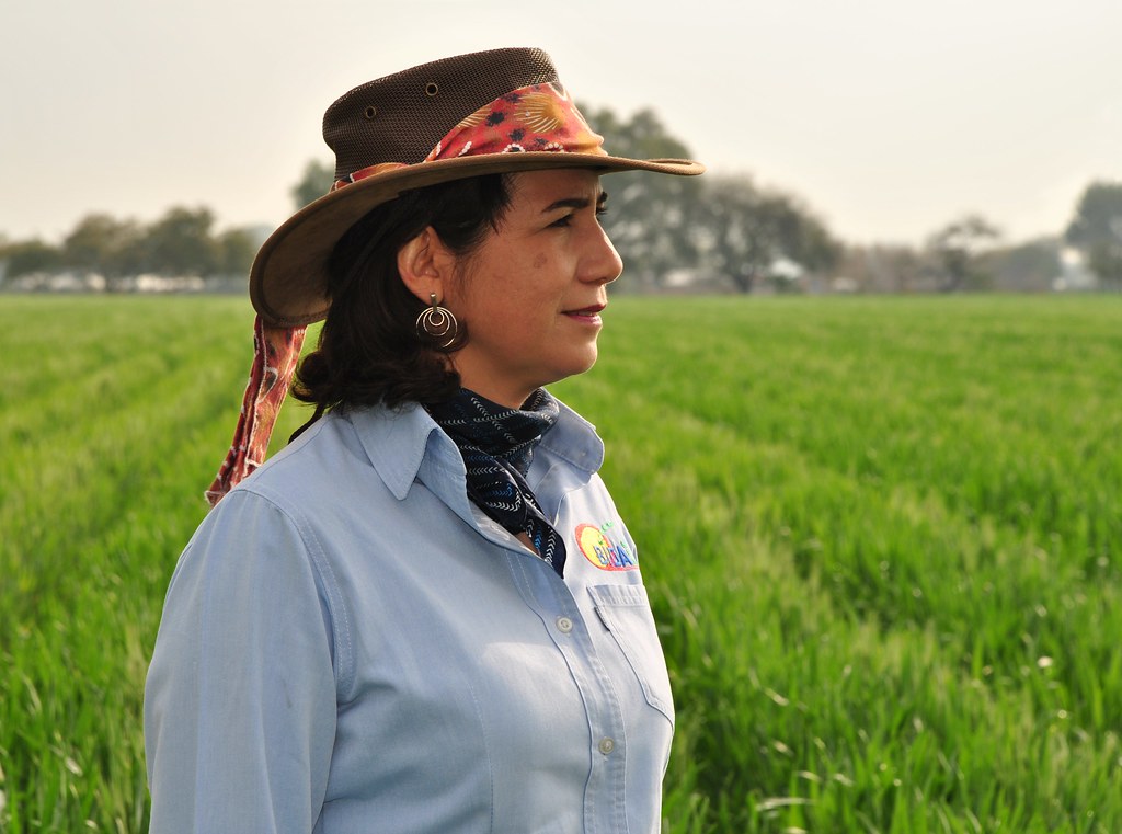 Small seed company head María Esther Rivas visits fields to check on