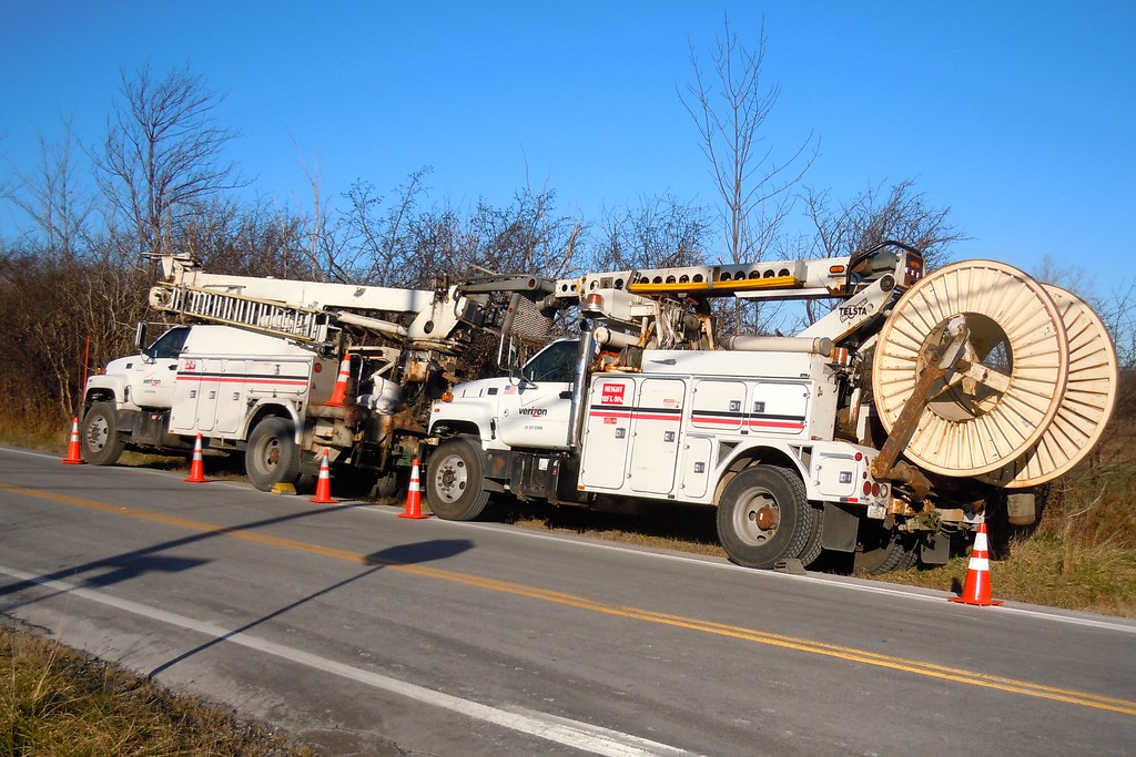 Verizon Line Trucks A pair of GMC Verizon line trucks park… Flickr