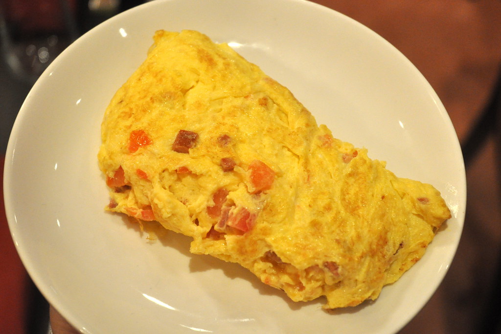 Papasito Omelet Chorizo, tomato and oaxaca cheese omelet d… Flickr