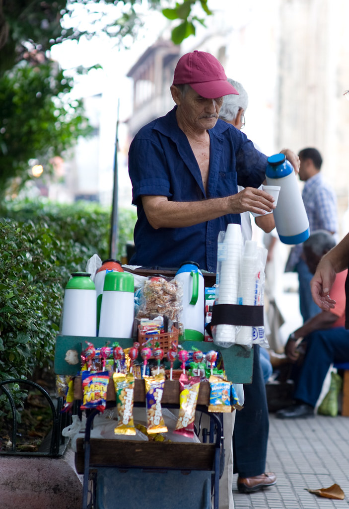 Jose Don Jose sells coffee and treats for kids in Parque B… Flickr