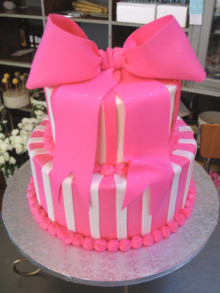 2tier Wicked Chocolate cake iced in hot pink & white butter icing