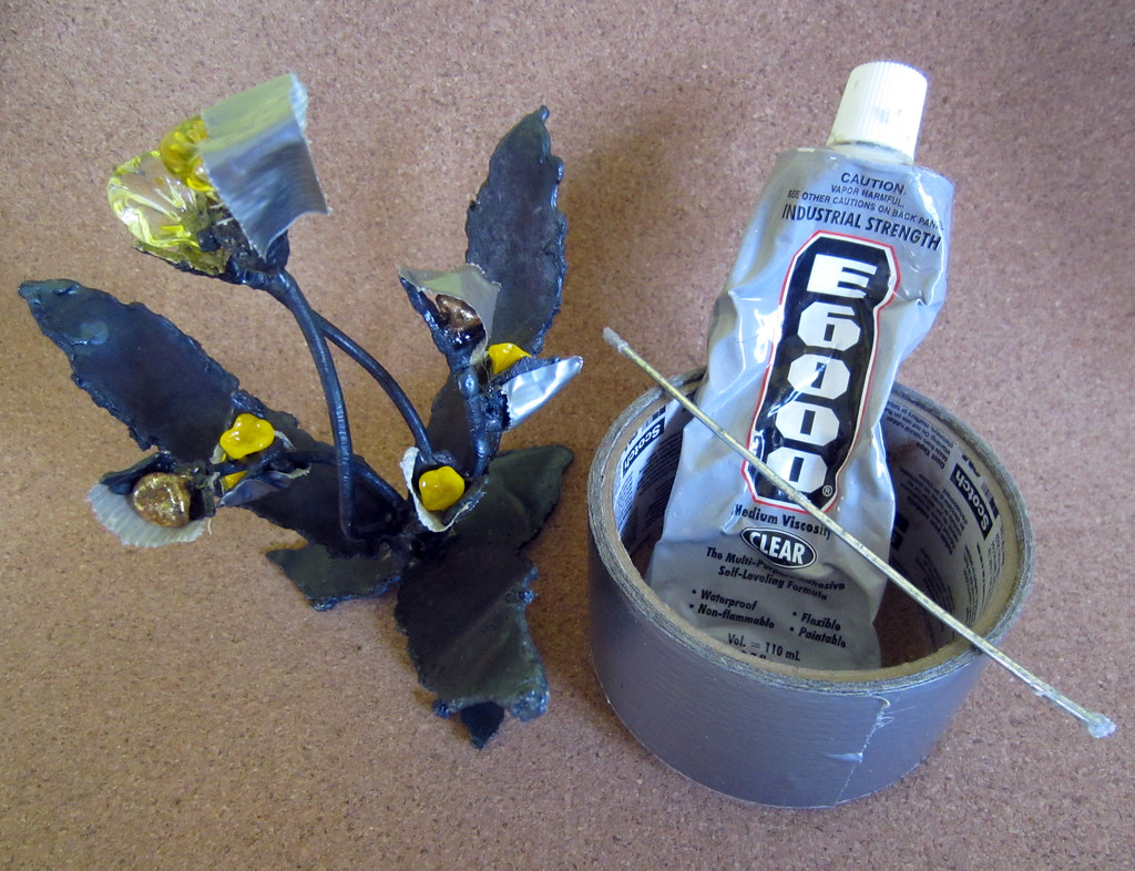 glass pieces glued into metal sculpture Happiness Sculptur… Flickr