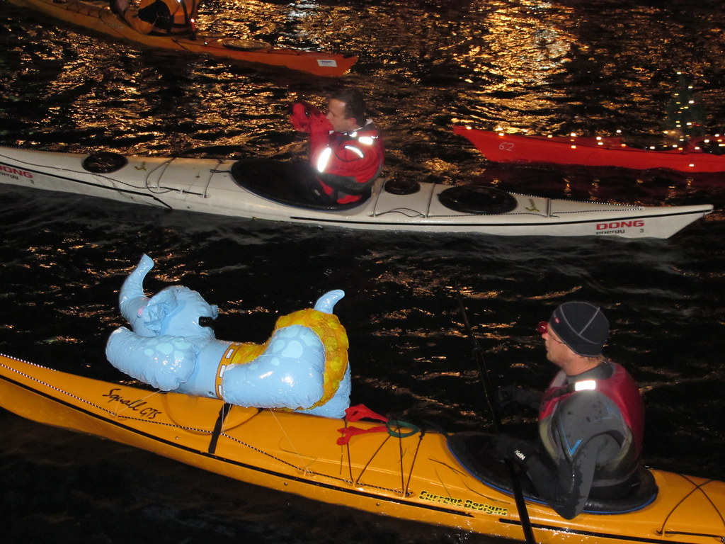 IMG_7402 Kayaks were pimped up with lights, christmas stuf… Flickr