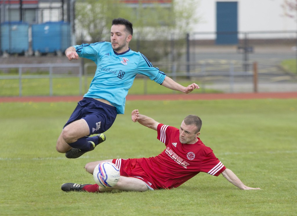 Barry McLaughlin earns a booking for a late challenge on G… Flickr