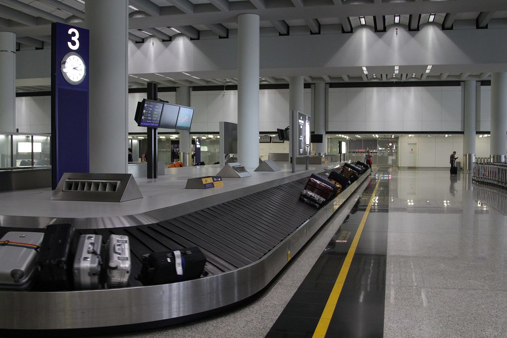 Baggage carousel in the arrivals hall at Hong Kong Airport a photo on
