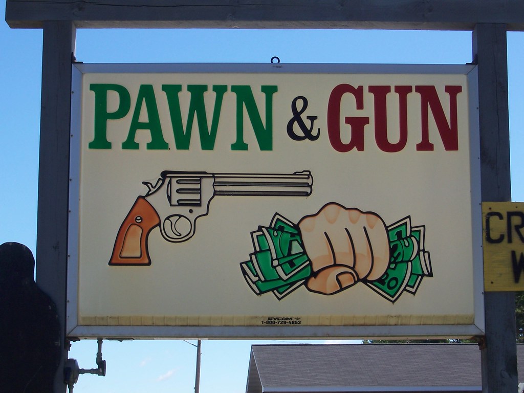 Pawn & Gun shop sign, Pembine, Wisconsin You'd never see a… Flickr