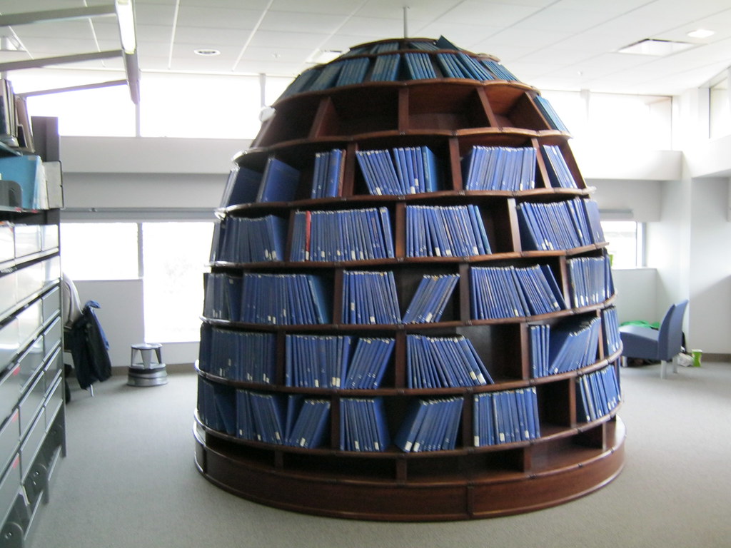 Skeptacle Beehiveshaped bookcase located on the 5th floor… Flickr