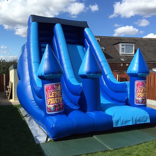 image Inflatable slide for hire at www.creamcastles.co.uk/… Flickr