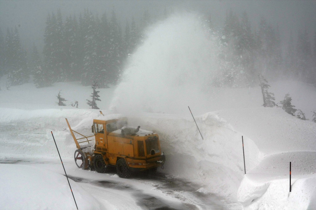 Snow Removal A rotary snow plow clears snow on a foggy Mar… Flickr