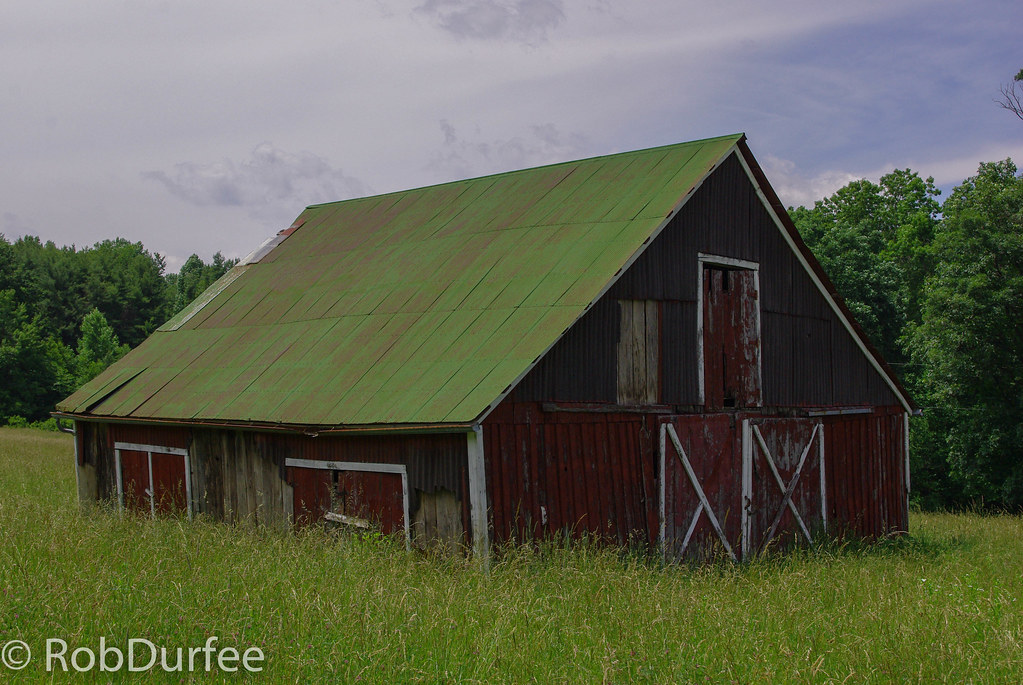 Red Barn, Green Roof I have driven by this barn numerous t… Flickr
