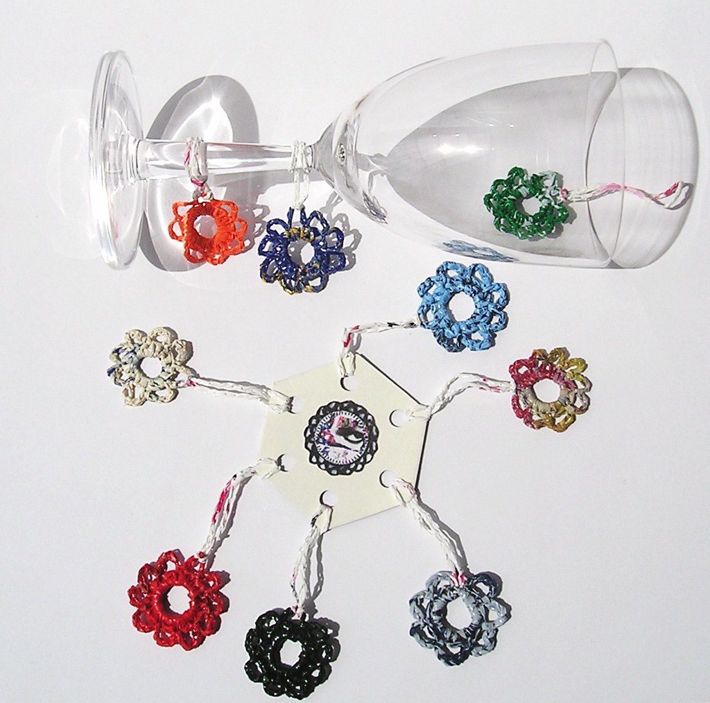 Flower wine charms crocheted from a plastic yarn upcycled … Flickr