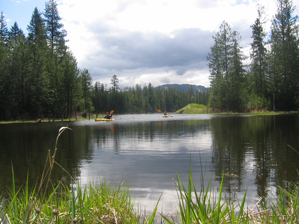 kayak on pond 020 Visit Sandpoint for wilderness kayaking Christine