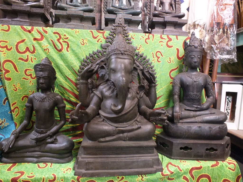 Ganesha and Buddha Ganesha with Buddha on either side cast… Flickr