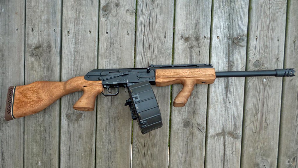 P1080019 A Saiga 12 with dual pistol grips & a 20 round dr… Flickr