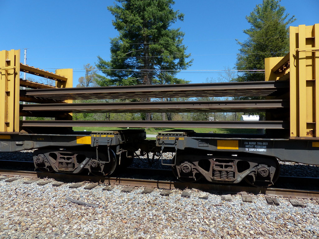 Loaded ribbon rail spanning coupled rail carriers Ron Cornelius Flickr
