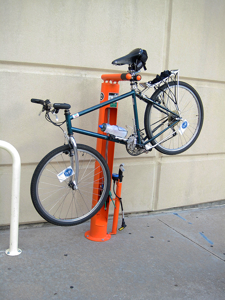 UTD Bike Repair Station Holding Rita If you like bikes… Flickr