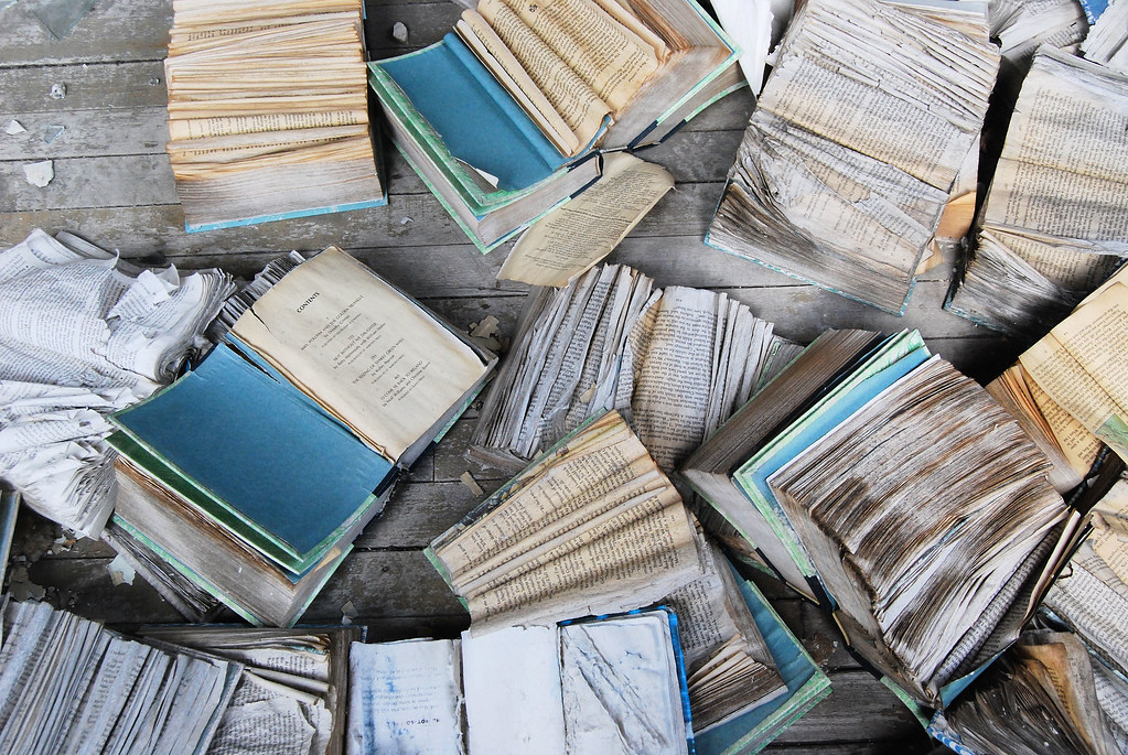 Abandoned Books These deteriorating books are scattered on… Flickr