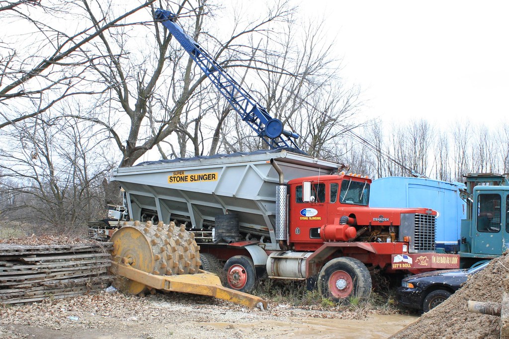 Super Stone Slinger on Oshkosh truck at contractors yard i… Flickr