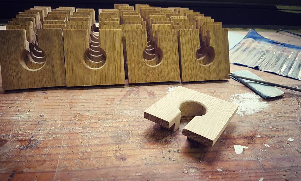 40 oak grommets for 40 desks. It's been a long haul, but s… Flickr