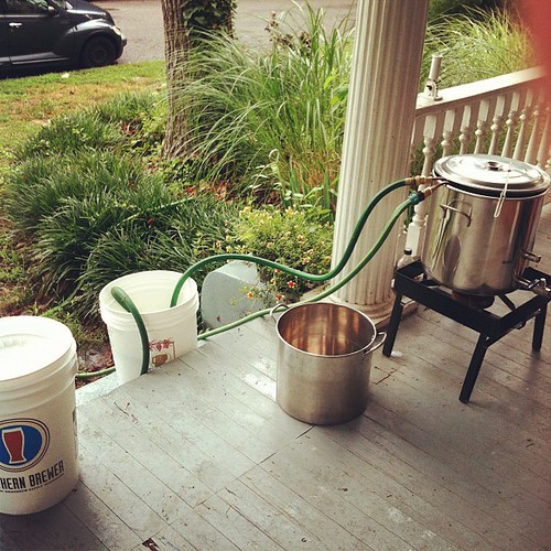 2 buckets, 2 hoses, 2 pots, 2 men = beer! Kristal Evens Flickr
