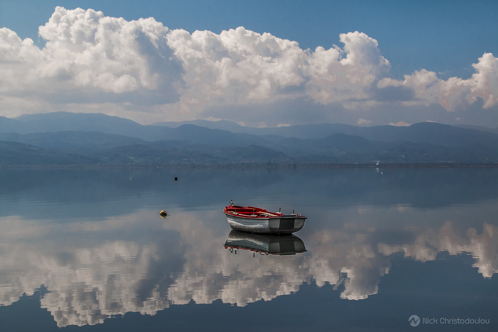 Boat in the clouds Nick Christodoulou Flickr