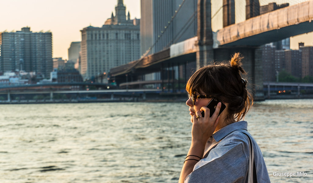 New York, girl talking on the phone in Brooklyn More info … Flickr