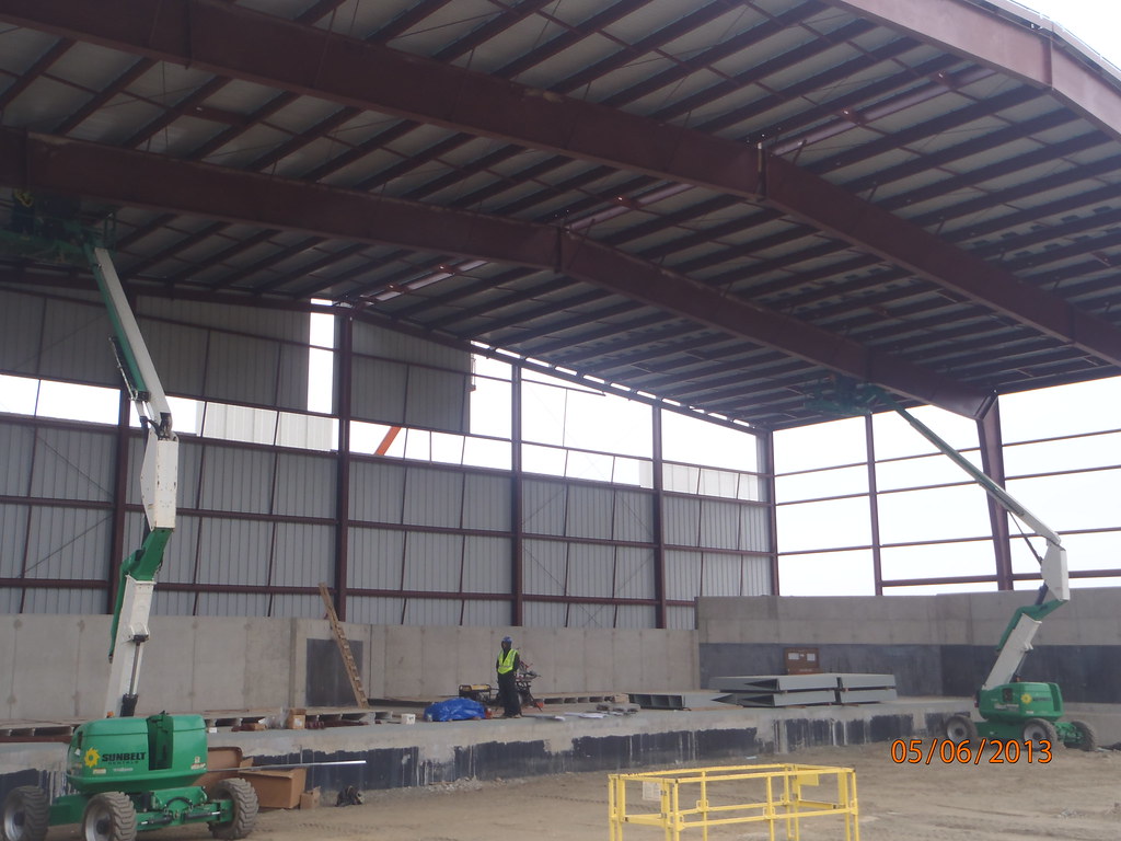 P5062417 Electricians installing conduit hangers for light… Flickr