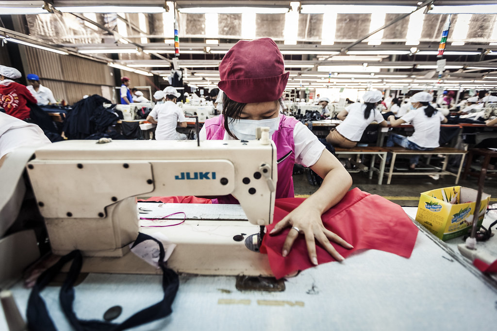 Garment factory in HCMC Work at a garment factory in the o… Flickr