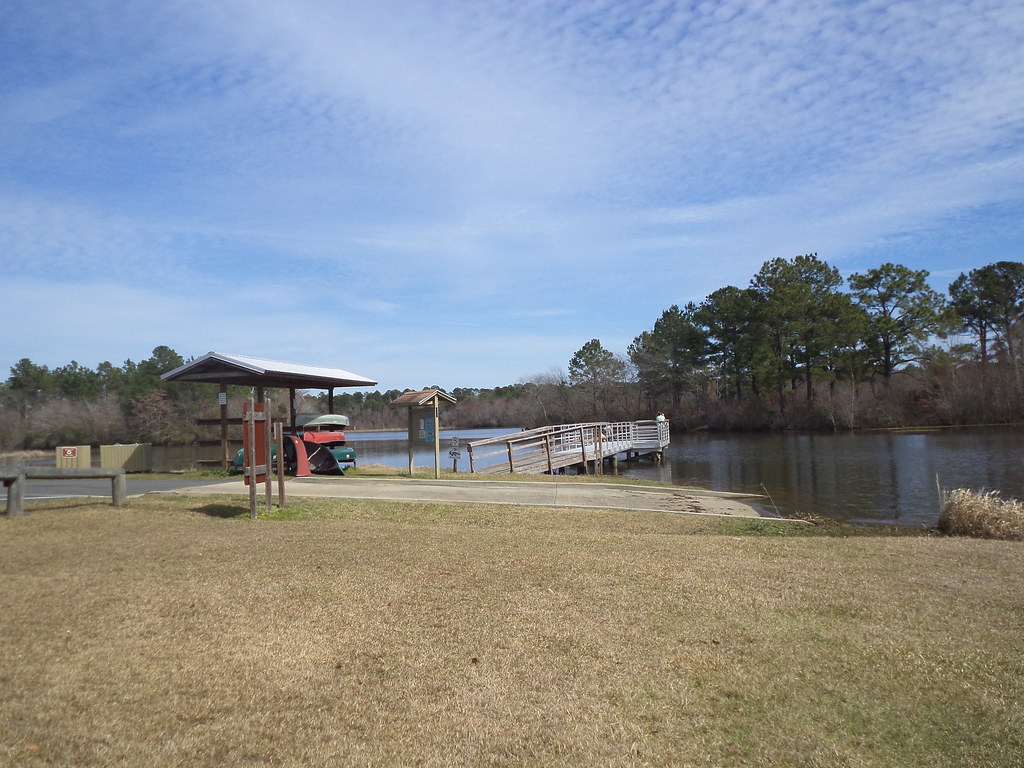 Reed Bingham State Park fishing pier and canoes MJRGoblin Flickr