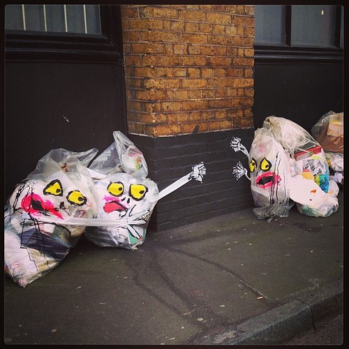 Bump into these funny trash bags today. They look scared! … Flickr