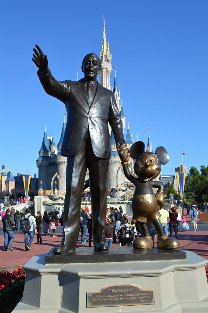 Walt Disney and Mickey Mouse statue in front of the Cinder… Flickr