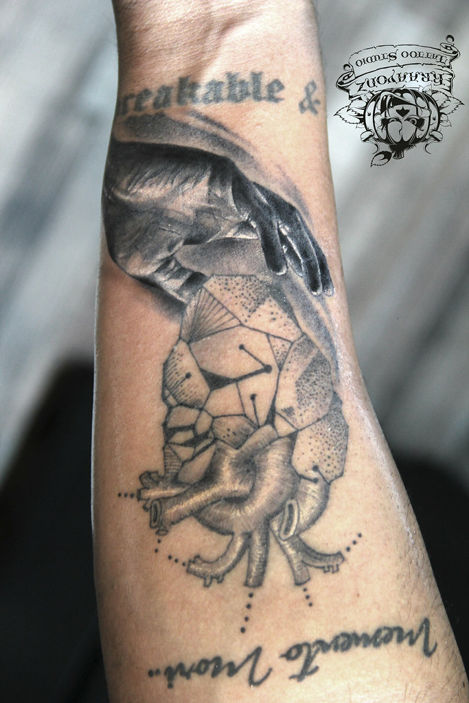 geometric heart with hand by sameer patange Kraayonz Tattoo Studio