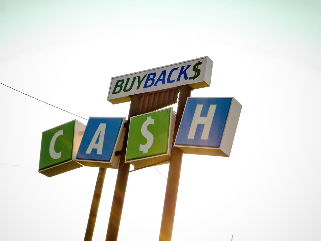Repurposed "Color Tile" sign This Buybacks location reuses… Flickr