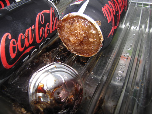 Exploded frozen Coke can I might want to defrost that frid… Flickr