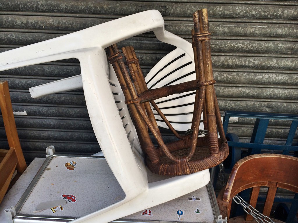Stool in Chair These chairs and stools were chained and st… Flickr