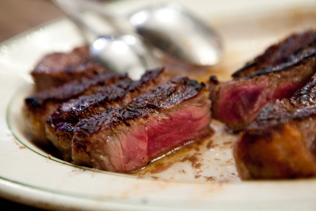 A perfect mediumrare porterhouse steak Peter Luger, Brook… Flickr