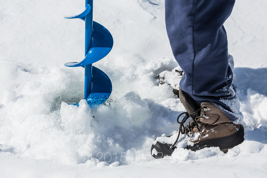 Drilling Hole for Ice Fishing with an Ice Auger in Michiga… Flickr