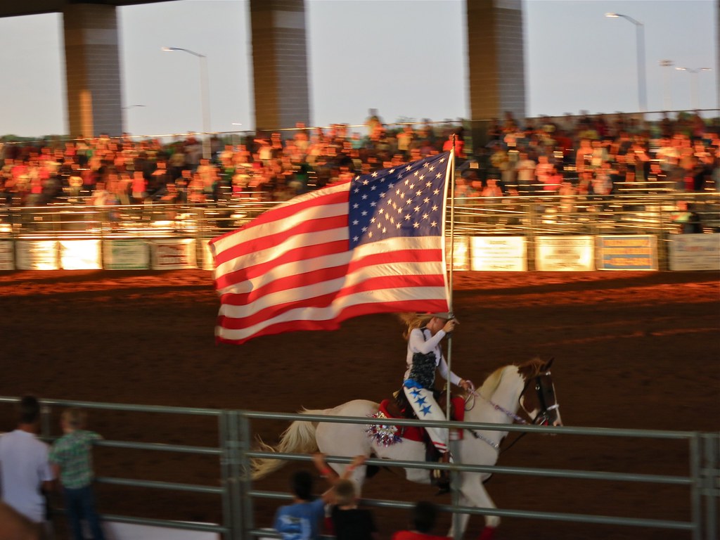 Rodeo flag {29/52} A giant American flag cruises past a bl… Flickr