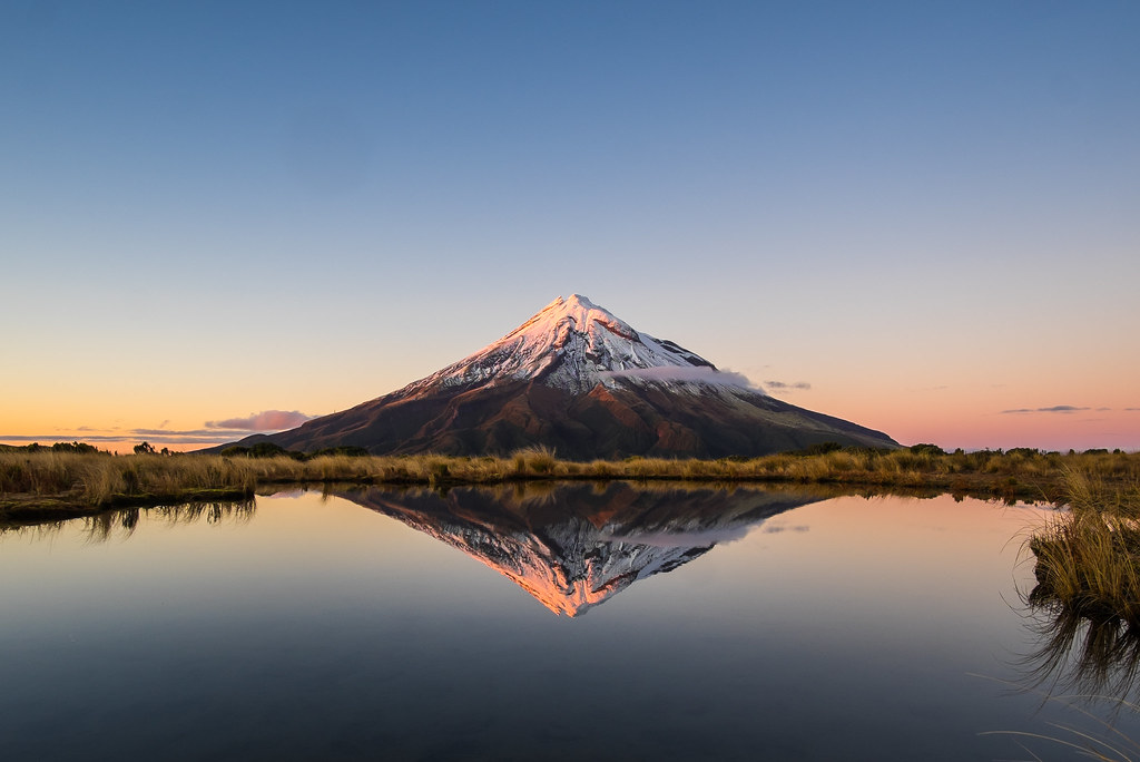 Taranaki reflections captured from Pouakai Tarn. It was al… Flickr