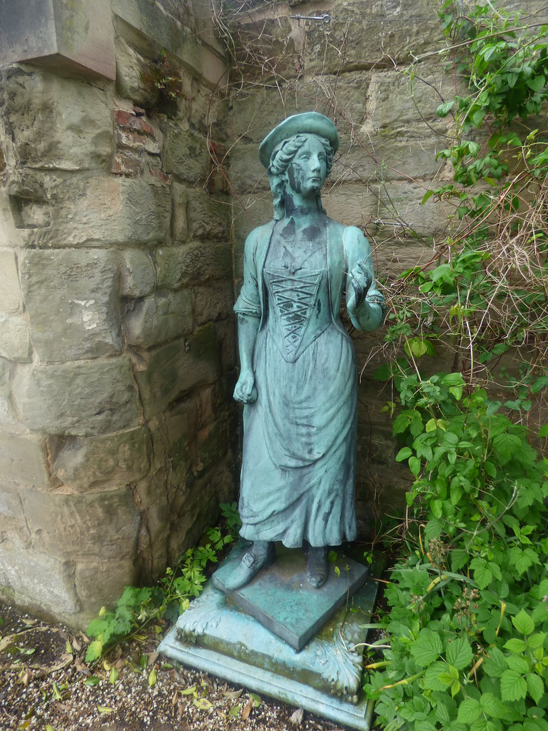 The gardens of St John's House, Warwick bronze statues a photo on