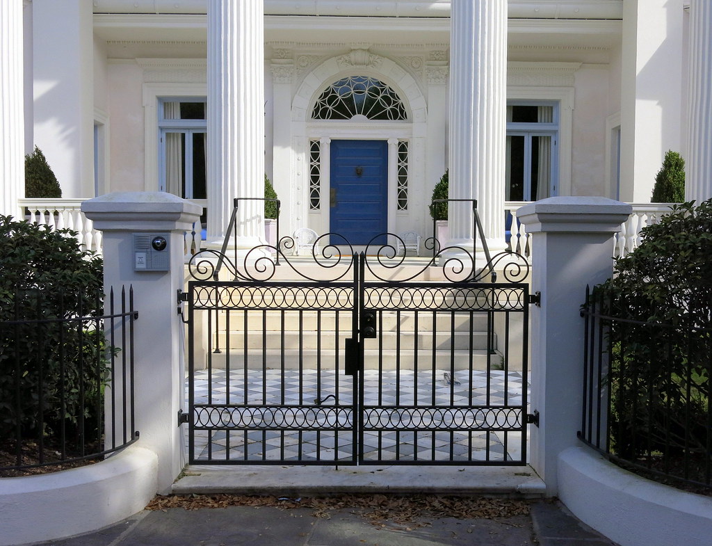 Iron gate and blue front door The Villa Margherita (1892… Flickr