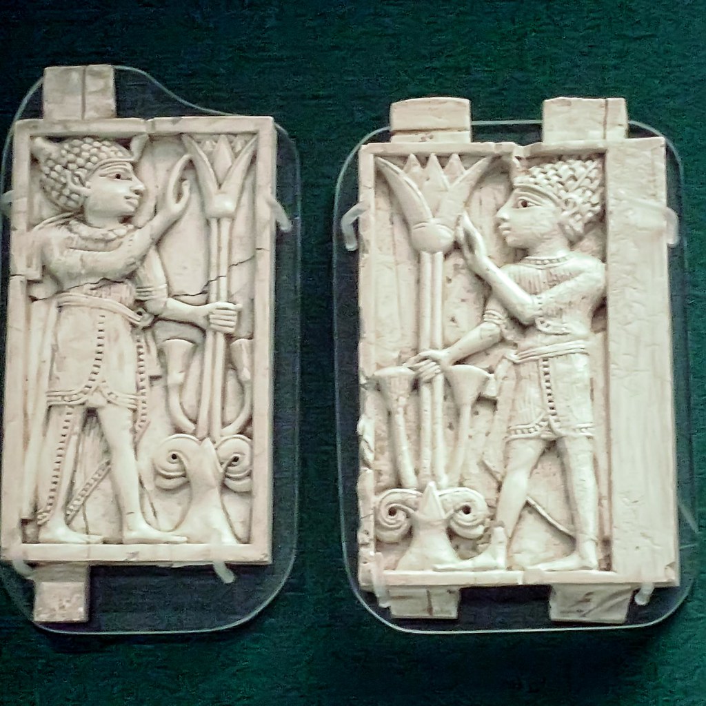 Phoenician Ivory furniture appliques depicting two youths … Flickr